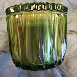 Homeworx 3 wick candle by Henry Slatkin. Green glass. Scent: By the Fireside